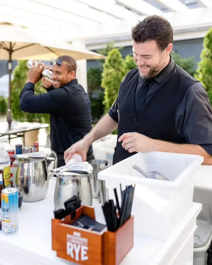 Caterer preparing drinks