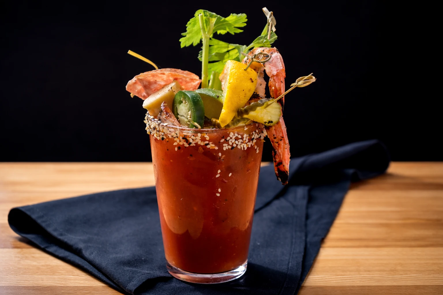 Gourmet Bloody Mary with shrimp, lemon, and garnishes served at a cocktail party catering event in Baltimore, MD
