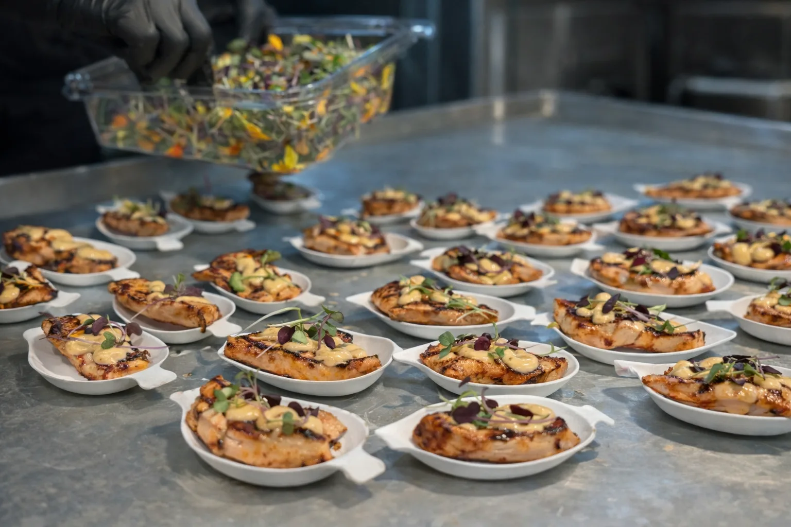 Bite-sized grilled salmon appetizers plated for a hors d'oeuvres catering event in Baltimore, MD