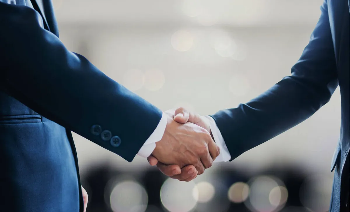 Full-service catering table setup with linens and place settings in Baltimore
